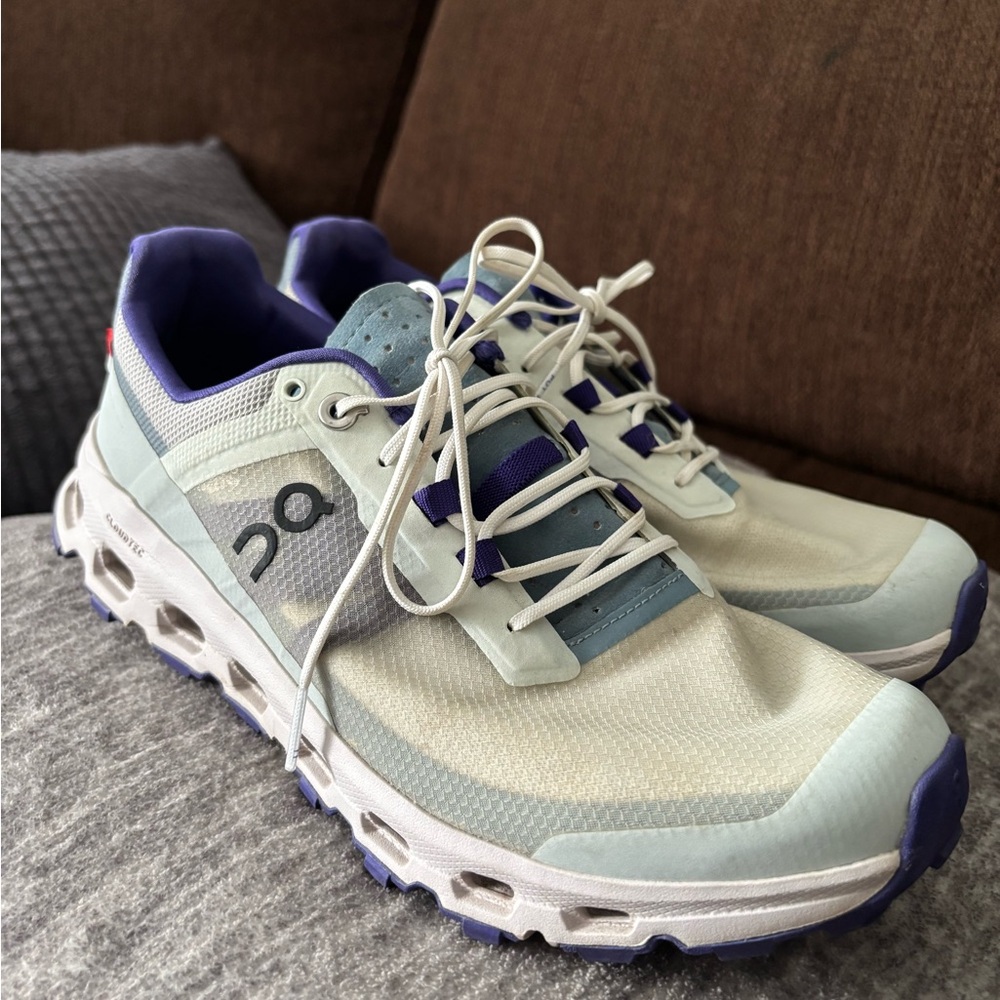 On Running White and Purple Sneakers